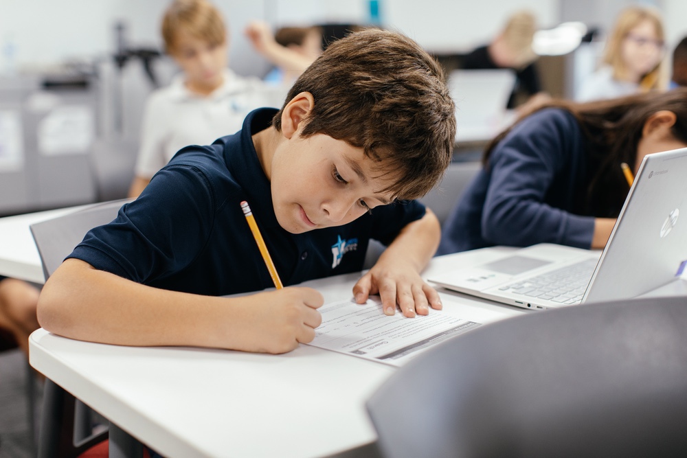 Mariners Christian School elementary boy writing 202266
